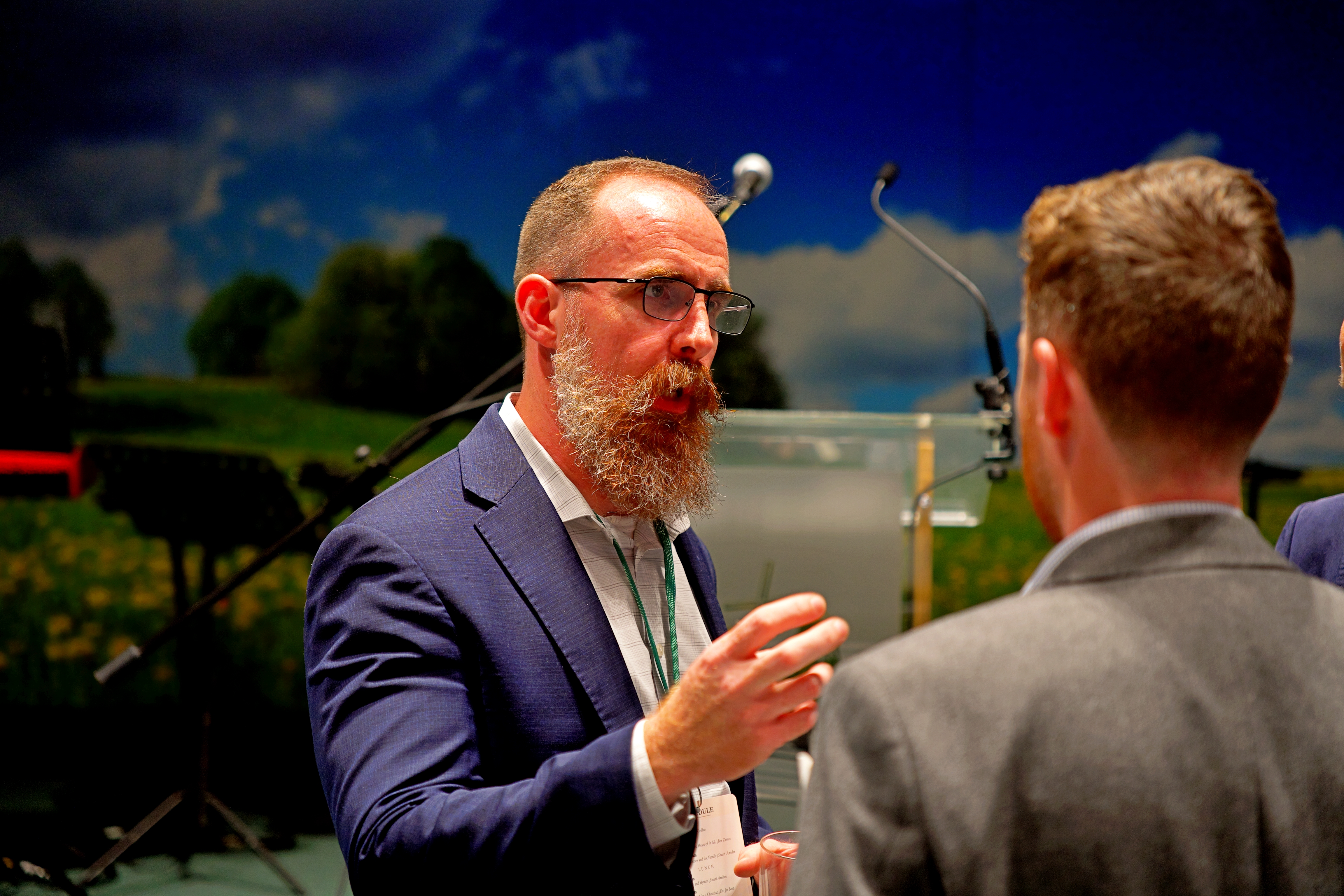 Two delegates in conversation